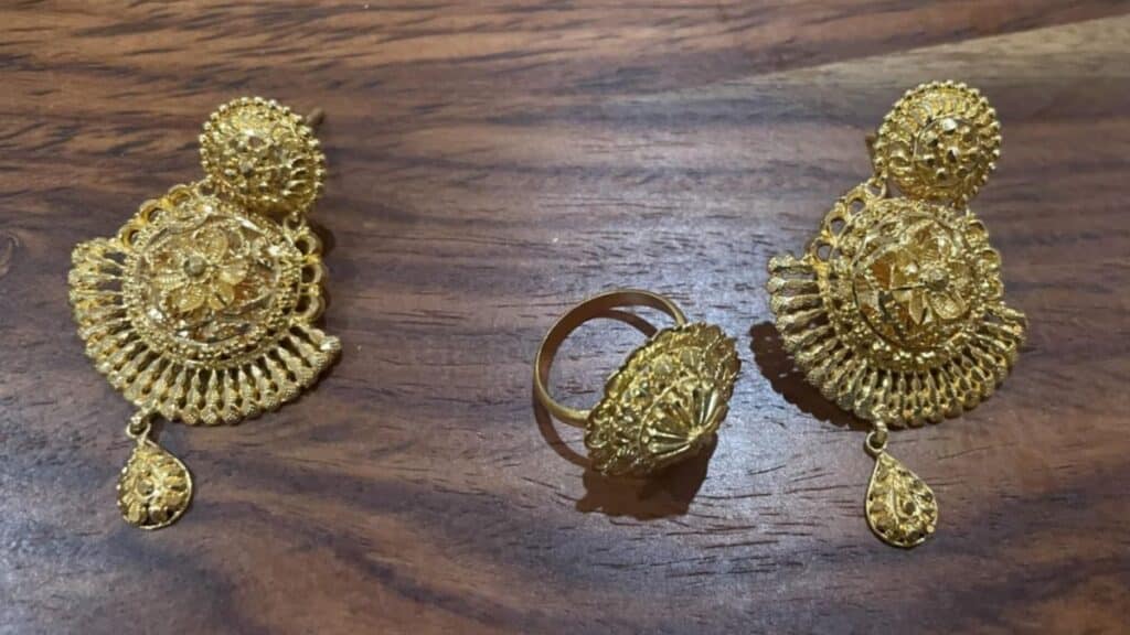 Stolen Indian gold earrings from Baltimore home burglary (Case #25-0066), featured at Stolen911.com