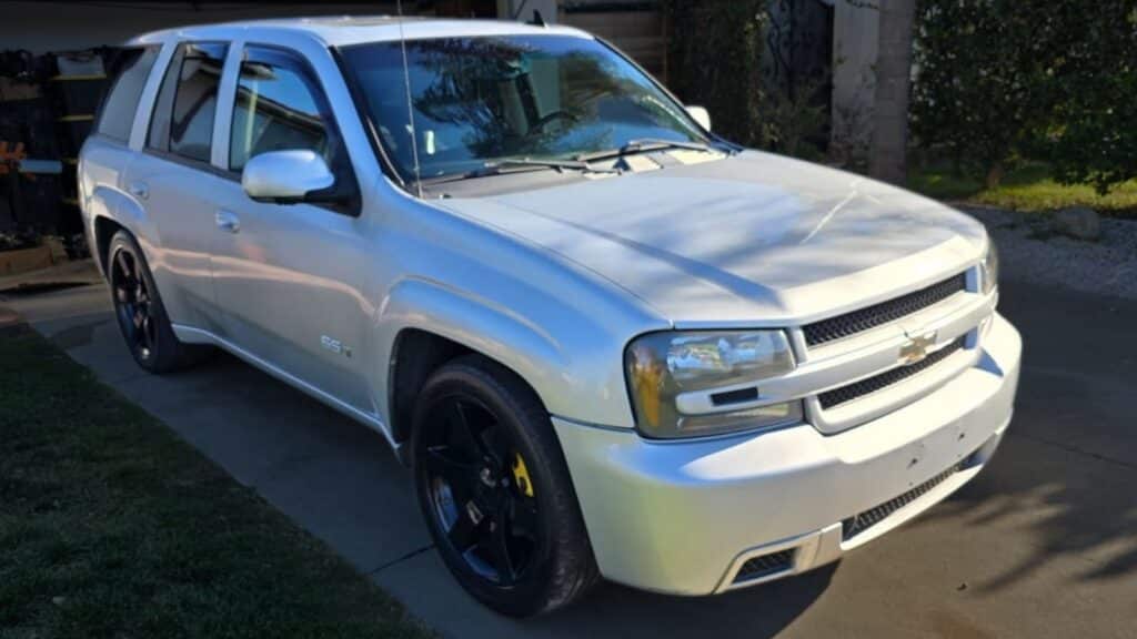 Stolen silver 2009 Chevrolet Trailblazer SS, VIN 1GNET53H592122762, License 8JUZ632. Stolen by a white unmarked tow truck in Downey, CA.