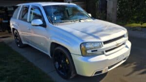 Stolen silver 2009 Chevrolet Trailblazer SS, VIN 1GNET53H592122762, License 8JUZ632. Stolen by a white unmarked tow truck in Downey, CA.