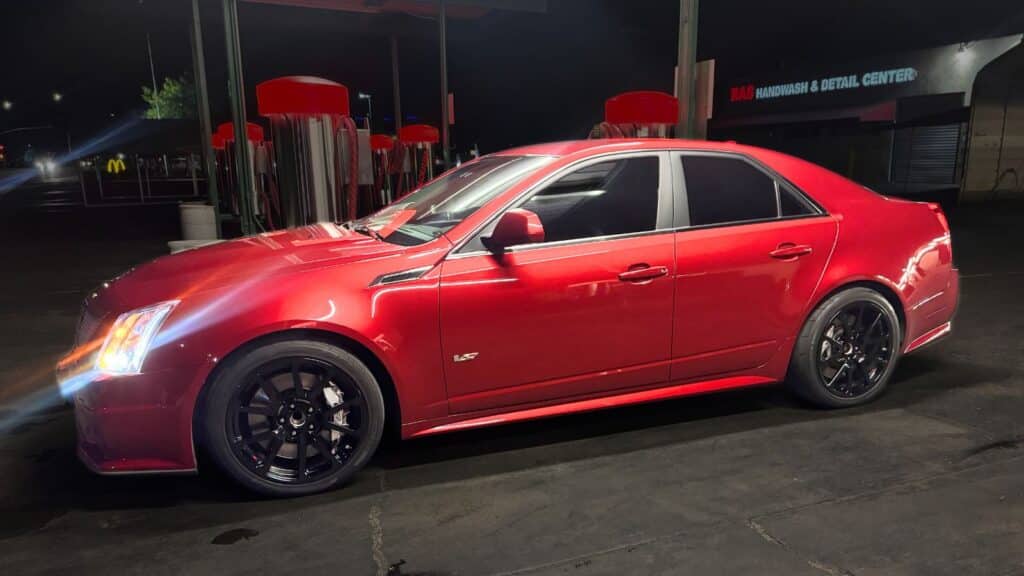 Stolen red 2011 Cadillac CTS-V, VIN 1G6DV5EP8B0153110, License 9SVZ193. Features black rims, black tinted windows, carbon fiber grill and spoiler. Stolen in Tracy, CA.