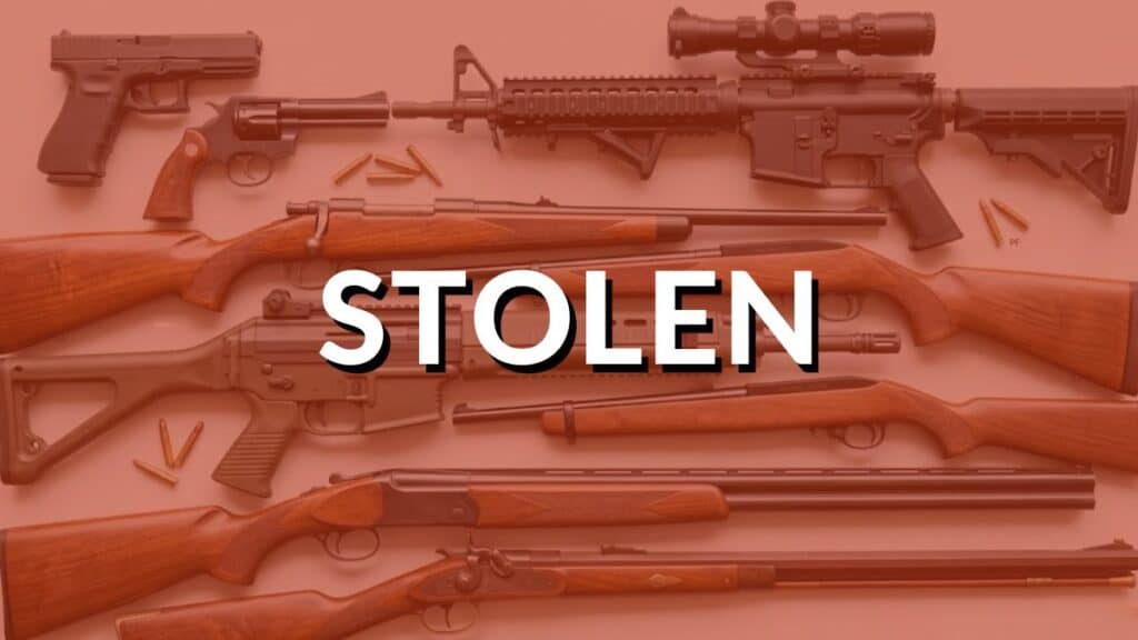 A monochrome, red-orange filtered image displaying a diverse collection of various modern and classic firearms, including handguns, tactical rifles with optics, and traditional hunting rifles with wood stocks, with large, bold white text overlaid centered in the image reading "STOLEN".