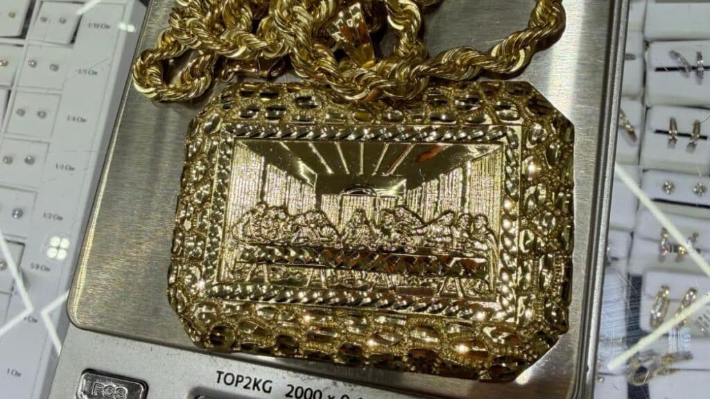 Stolen custom 10kt yellow gold rope chain with diamond cut last supper pendant from San Antonio Texas, Stolen 46.1 gram yellow gold last supper pendant and necklace chain