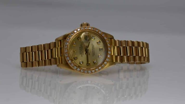 Stolen yellow gold 1978 ladies Rolex Oyster Perpetual Datejust with diamond markers and bezel, serial number 5184945.