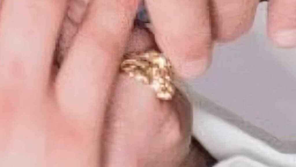Stolen custom made yellow gold ring set with diamonds.