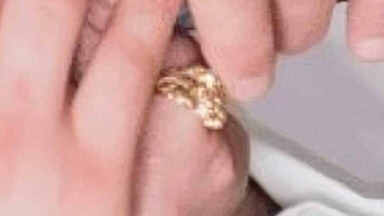 Stolen custom made yellow gold ring set with diamonds.