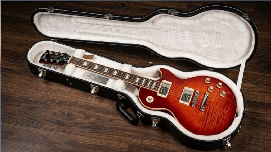 A Stolen Gibson Les Paul Slash Vermillion Serial Number 128930491.